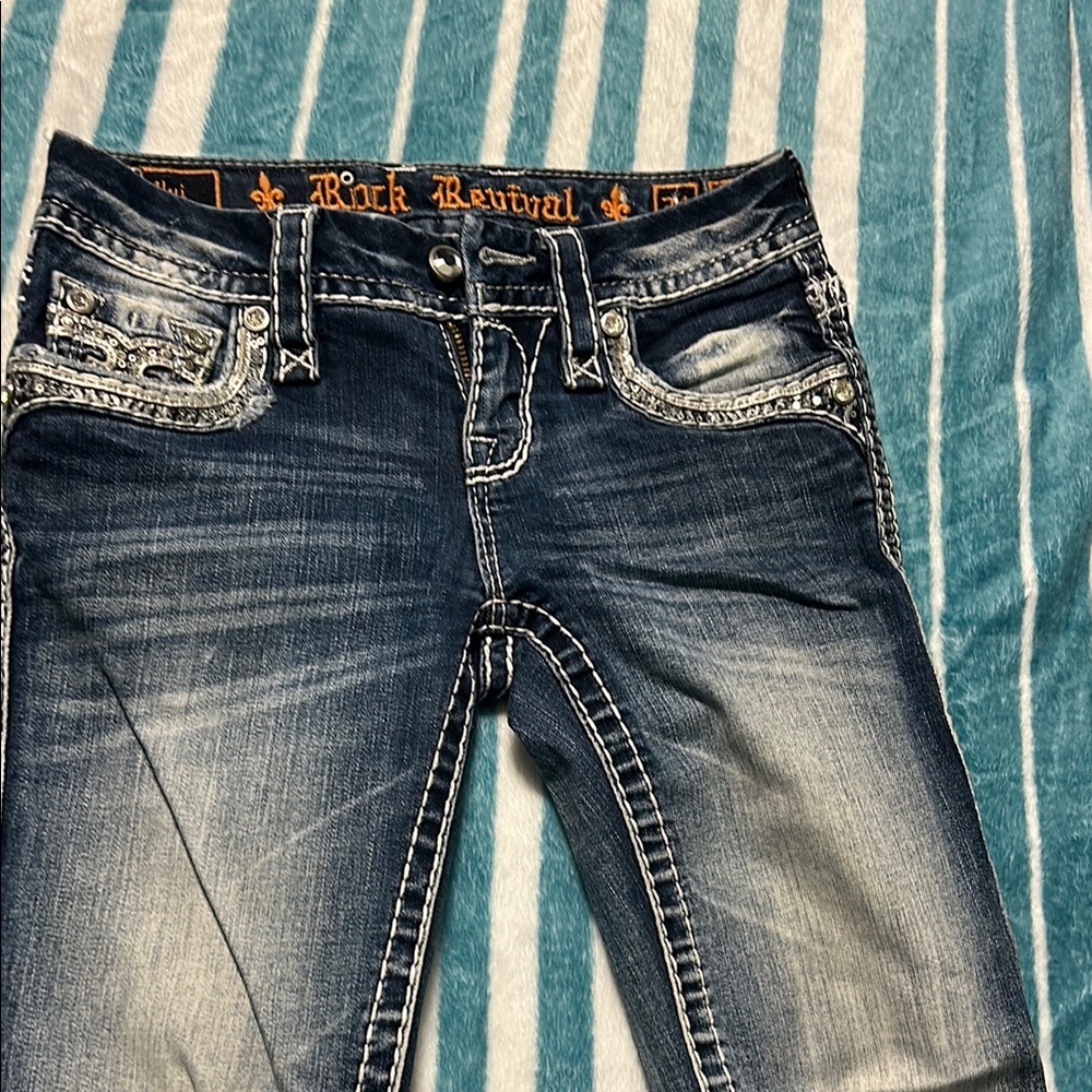 Rock Revival Blue Boot Cut Jeans with Distinctive Fading size 24